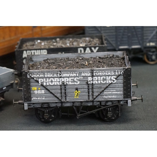 99 - 12 O gauge items of kit built rolling stock featuring trucks, vans and a K4 Dean PBV in brown livery... 