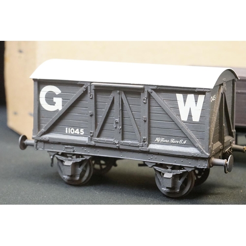 99 - 12 O gauge items of kit built rolling stock featuring trucks, vans and a K4 Dean PBV in brown livery... 