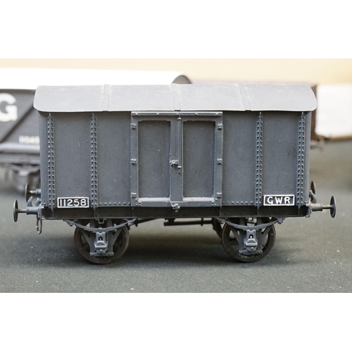 99 - 12 O gauge items of kit built rolling stock featuring trucks, vans and a K4 Dean PBV in brown livery... 