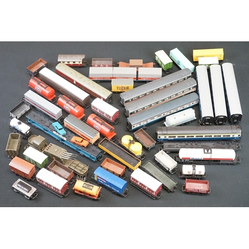 111 - Over 45 OO gauge items of rolling stock to include coaches, car transporter, tankers, vans etc featu... 