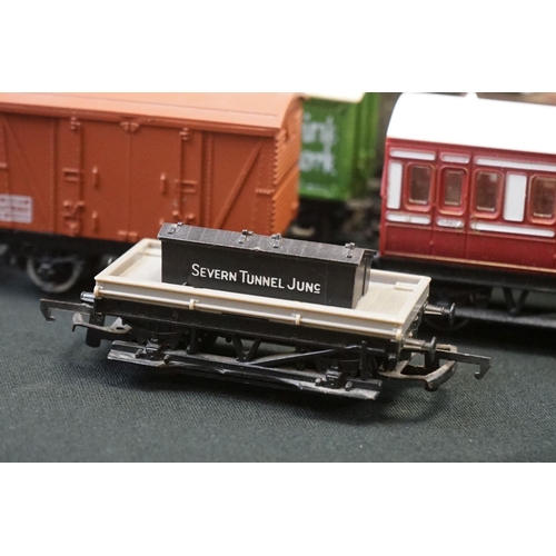 111 - Over 45 OO gauge items of rolling stock to include coaches, car transporter, tankers, vans etc featu... 