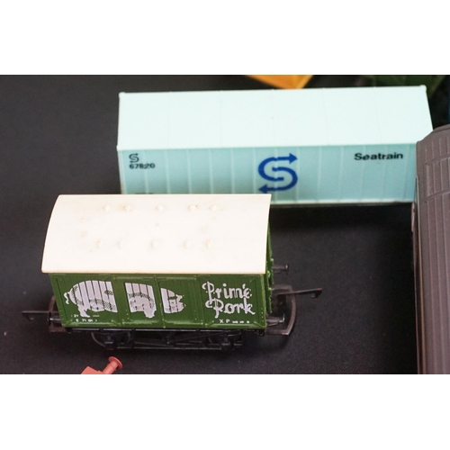 111 - Over 45 OO gauge items of rolling stock to include coaches, car transporter, tankers, vans etc featu... 