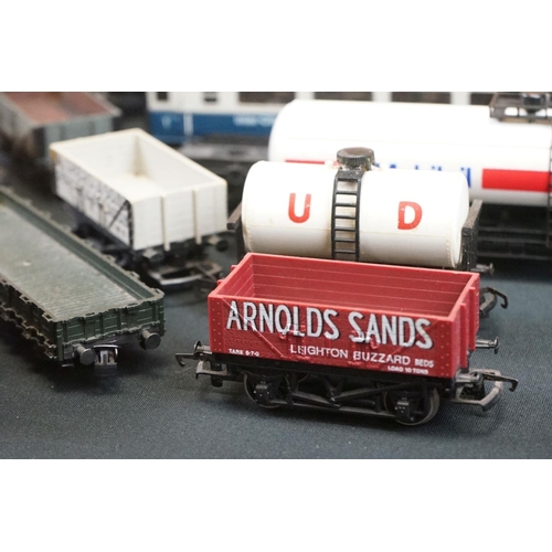 111 - Over 45 OO gauge items of rolling stock to include coaches, car transporter, tankers, vans etc featu... 