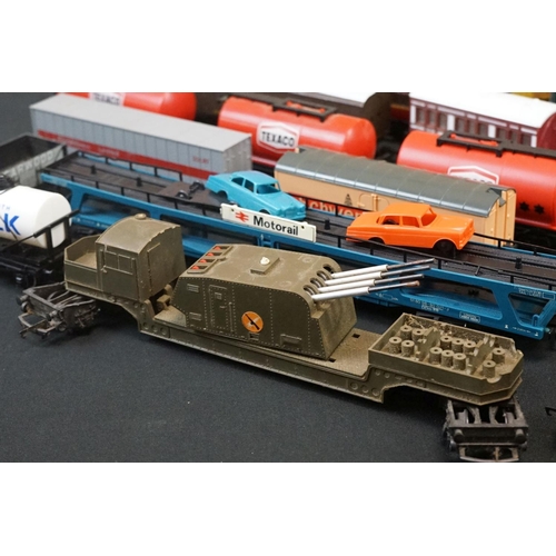 111 - Over 45 OO gauge items of rolling stock to include coaches, car transporter, tankers, vans etc featu... 