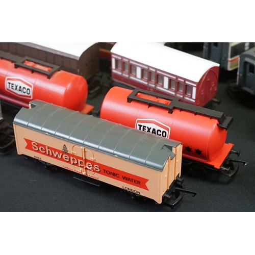 111 - Over 45 OO gauge items of rolling stock to include coaches, car transporter, tankers, vans etc featu... 