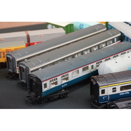 111 - Over 45 OO gauge items of rolling stock to include coaches, car transporter, tankers, vans etc featu... 