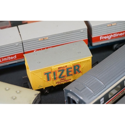 111 - Over 45 OO gauge items of rolling stock to include coaches, car transporter, tankers, vans etc featu... 