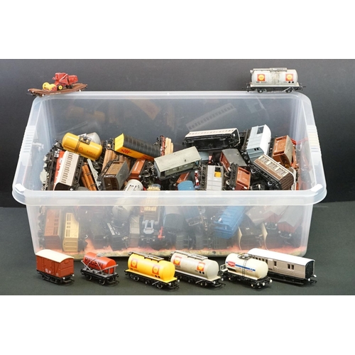 112 - Around 90 OO gauge items of rolling stock featuring tankers, vans and trucks to include Hornby, Tria... 