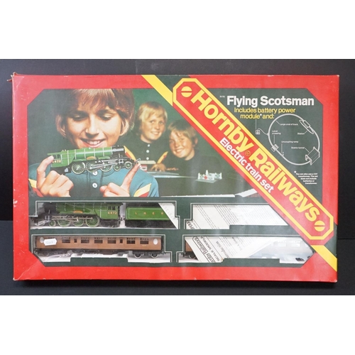 114 - Three boxed OO gauge train sets to include Hornby R176 Flying Scotsman set, Lima Inter City 125 set ... 