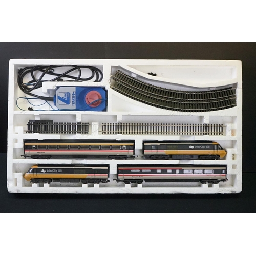 114 - Three boxed OO gauge train sets to include Hornby R176 Flying Scotsman set, Lima Inter City 125 set ... 