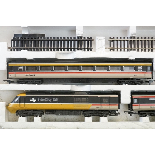 114 - Three boxed OO gauge train sets to include Hornby R176 Flying Scotsman set, Lima Inter City 125 set ... 