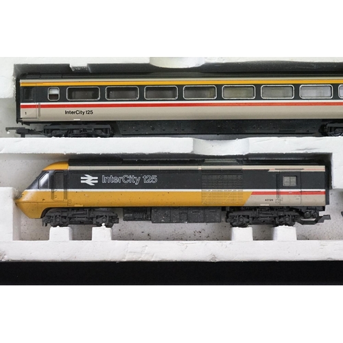 114 - Three boxed OO gauge train sets to include Hornby R176 Flying Scotsman set, Lima Inter City 125 set ... 