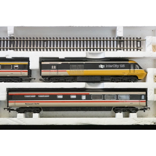 114 - Three boxed OO gauge train sets to include Hornby R176 Flying Scotsman set, Lima Inter City 125 set ... 