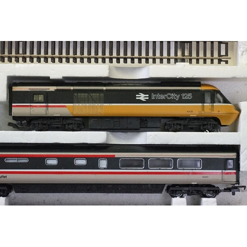 114 - Three boxed OO gauge train sets to include Hornby R176 Flying Scotsman set, Lima Inter City 125 set ... 