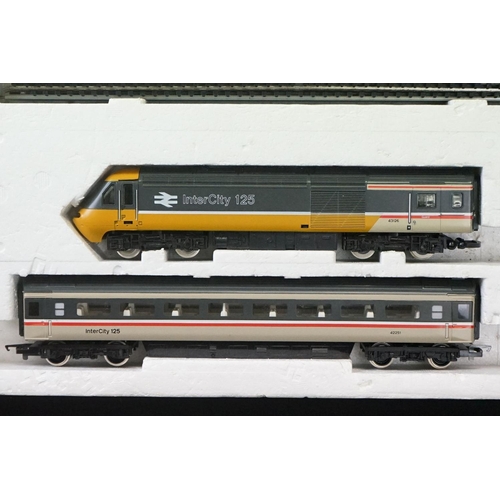 114 - Three boxed OO gauge train sets to include Hornby R176 Flying Scotsman set, Lima Inter City 125 set ... 