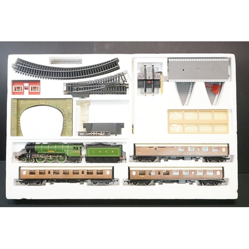 114 - Three boxed OO gauge train sets to include Hornby R176 Flying Scotsman set, Lima Inter City 125 set ... 