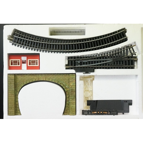 114 - Three boxed OO gauge train sets to include Hornby R176 Flying Scotsman set, Lima Inter City 125 set ... 