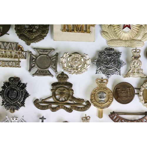 291 - A Collection Of Mainly British Military Regimental Cap Badges And Titles To Include The Royal Engine... 