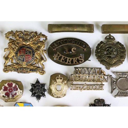 291 - A Collection Of Mainly British Military Regimental Cap Badges And Titles To Include The Royal Engine... 