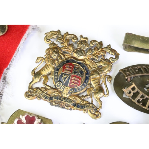 291 - A Collection Of Mainly British Military Regimental Cap Badges And Titles To Include The Royal Engine... 