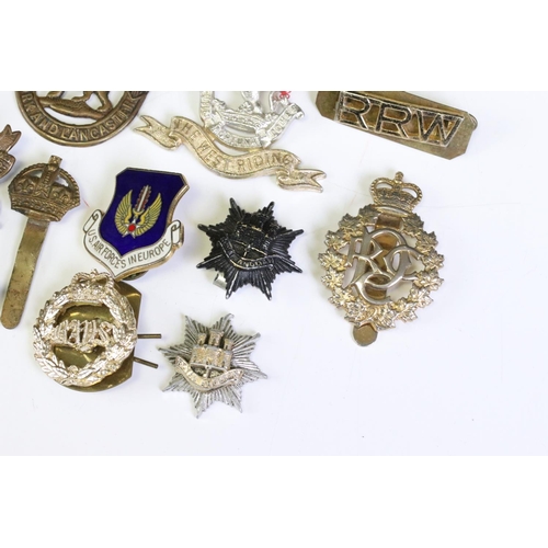 291 - A Collection Of Mainly British Military Regimental Cap Badges And Titles To Include The Royal Engine... 