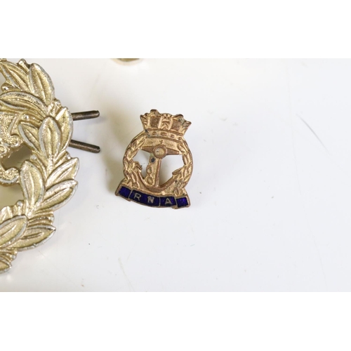 291 - A Collection Of Mainly British Military Regimental Cap Badges And Titles To Include The Royal Engine... 