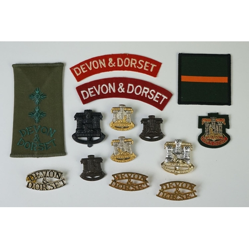 14 - A Collection Of Fourteen British Military The Devon & Dorset Regiment Badges To Include Shoulder Tit... 