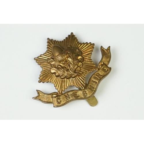 5 - A British Military The Cheshire Regiment All Brass Other Ranks Cap Badge With Slider Fixing To Verso... 