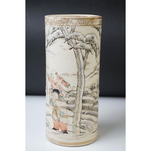 19 - Pair of Chinese Porcelain Brush Pots, with enamelled decoration depicting figures playing in a mount... 