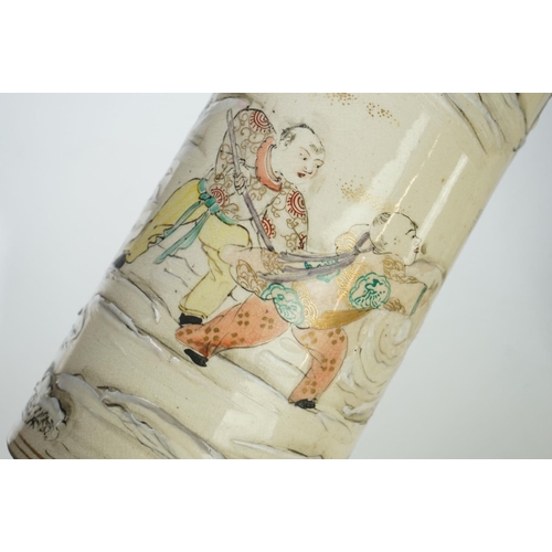 19 - Pair of Chinese Porcelain Brush Pots, with enamelled decoration depicting figures playing in a mount... 