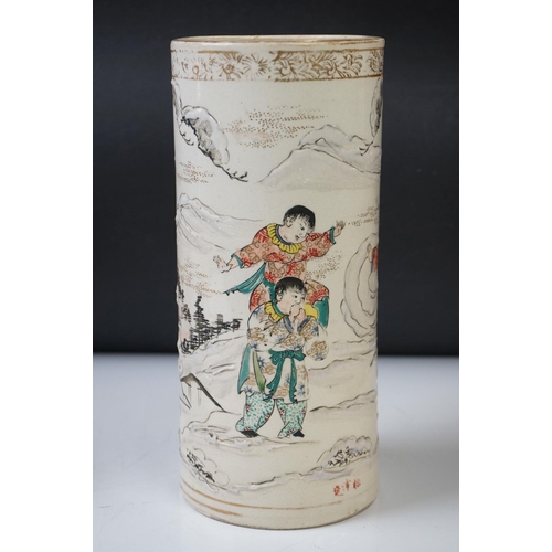 19 - Pair of Chinese Porcelain Brush Pots, with enamelled decoration depicting figures playing in a mount... 