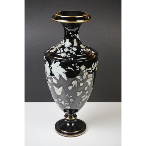 2 - Late 19th Century Black Urn-shaped Glass Vase enamelled with butterflies amongst leafy branches, wit... 