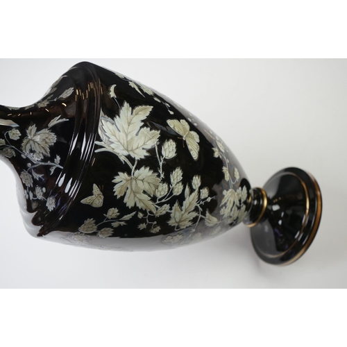 2 - Late 19th Century Black Urn-shaped Glass Vase enamelled with butterflies amongst leafy branches, wit... 