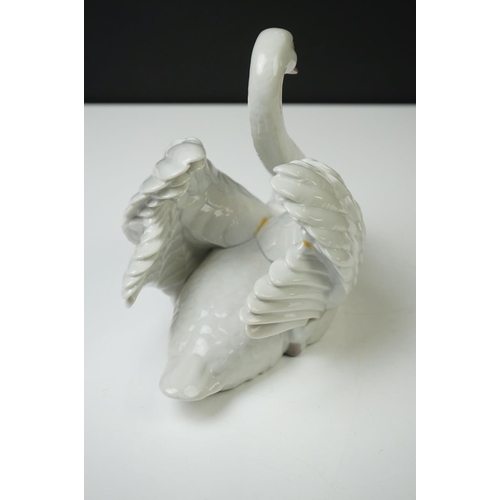 25 - Lladro Porcelain Swan Figure (no. 5231 - 18cm high), together with a Border Fine Arts sculpture of a... 