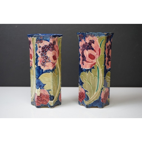 28 - Two Bursley Ware ' Seed Poppy ' pattern tube lined hexagonal vases, designed by Charlotte Rhead, mea... 