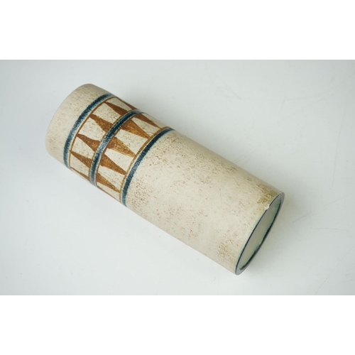 41 - Troika pottery cylindrical vase with 'sharks tooth' banding on a textured ground, signed 'Troika, Co... 