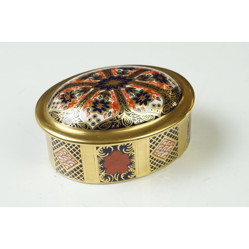 50 - Ten Royal Crown Derby Imari pattern lidded trinket boxes and storage jars, largest approx 11cm wide