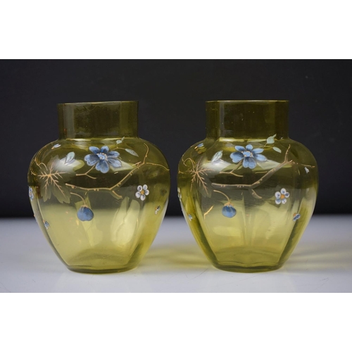 56 - Pair of Victorian green glass vases with enamelled floral decoration, of ovoid form (10.5cm high), t... 