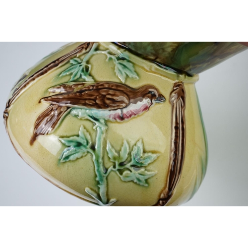 9 - Late 19th Century Aesthetic Movement Majolica Vase, with relief moulded panels depicting birds perch... 