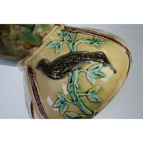 9 - Late 19th Century Aesthetic Movement Majolica Vase, with relief moulded panels depicting birds perch... 