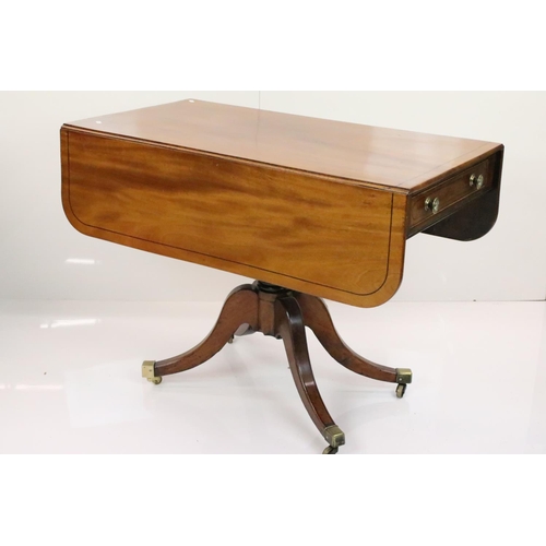 588 - Regency Mahogany Drop Flap Breakfast Table, two drawers to either end,  raised on quadruped swept su... 