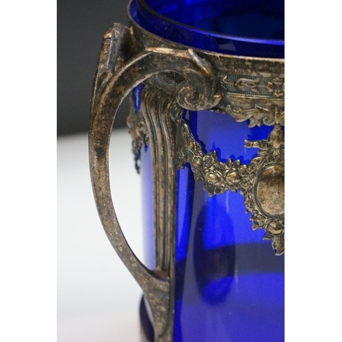 76 - WMF Silver Plated Biscuit Barrel and Cover with blue glass liner, stamped to base, 24cm high