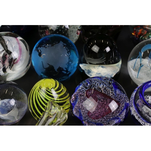 112 - Collection of approximately Thirty Five Glass Paperweights including Caithness and Langham, some in ... 