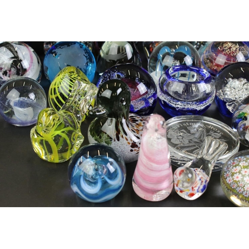 112 - Collection of approximately Thirty Five Glass Paperweights including Caithness and Langham, some in ... 