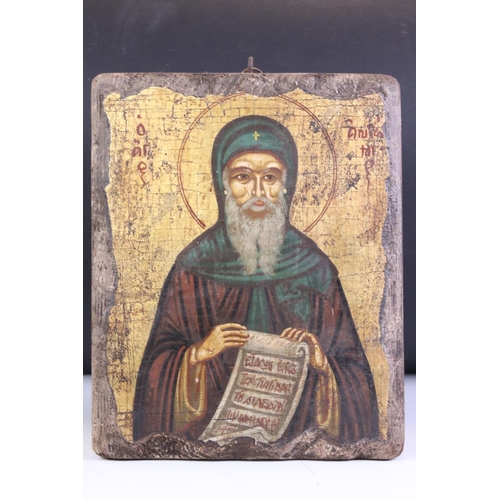 145 - Tempera style on Wooden Panel depicting a Saint or Religious Icon holding a scroll, 27cm x 22cm