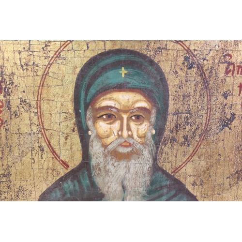 145 - Tempera style on Wooden Panel depicting a Saint or Religious Icon holding a scroll, 27cm x 22cm