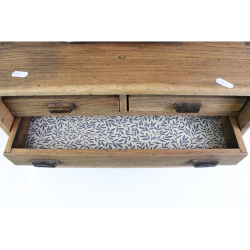 148 - 19th / Early 20th century Oak Engineers Four Drawer Cabinet with carrying handle to top, 46cm wide x... 