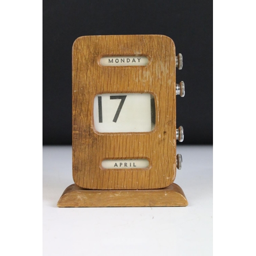 158 - Early 20th century Oak Perpetual Desk Calendar with date, day and month apertures, 13.5cm high