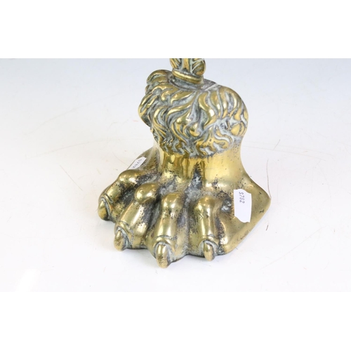 164 - 19th century Brass ' Lion Paw ' Doorstop with foliate loop handle and weighted base, 39.5cm high