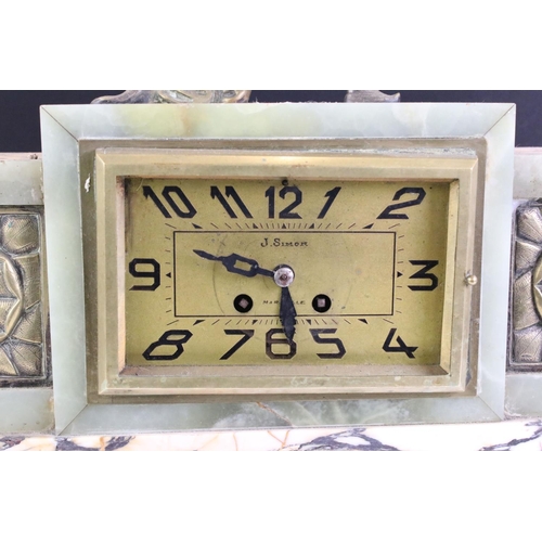 177 - An Art Deco marble and green onyx mantle clock with female figure to the top, the clock face marked ... 